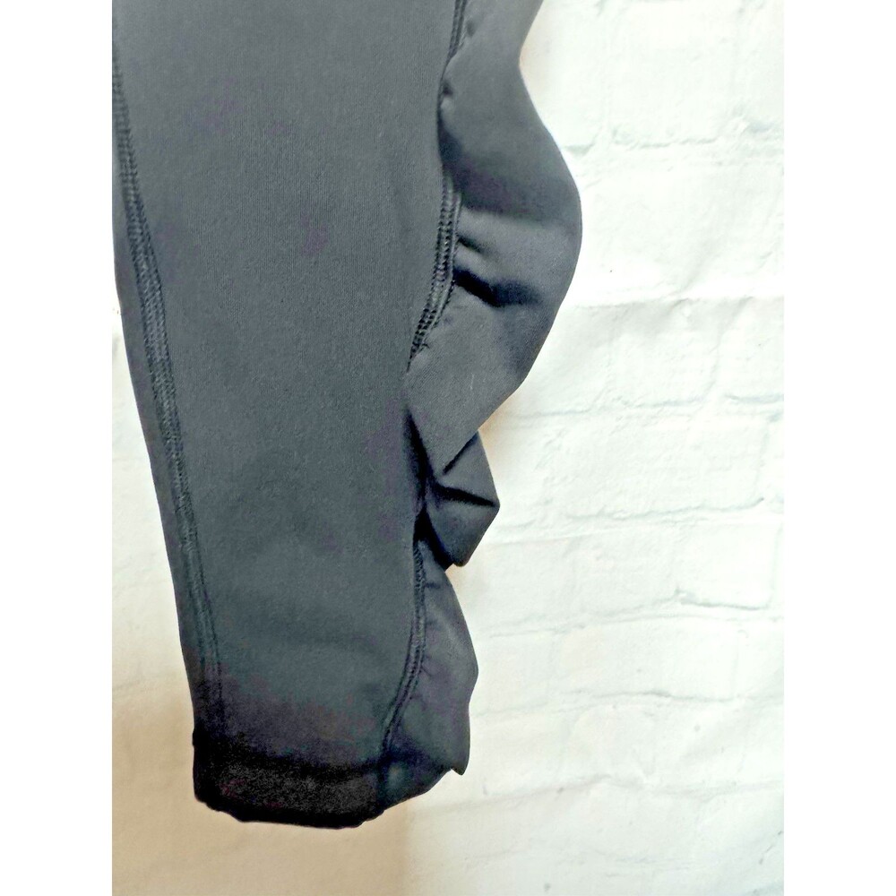 LULULEMON black ruched ruffle leggings size 4 Side pockets red band - Picture 4 of 9